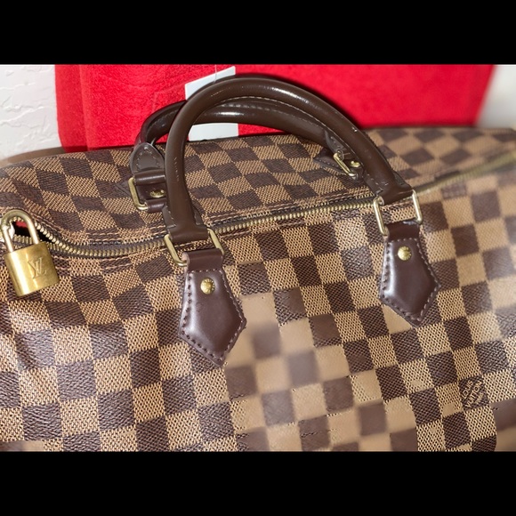 Authentic Damier Ebene Speedy B 35
Date:SD 0157
Includes Dust Bag & LV Box - Picture 12 of 16
